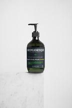 A pump bottle of Aromanesque Hand & Body Wash with patchouli and amber vanilla scents, 490ml.