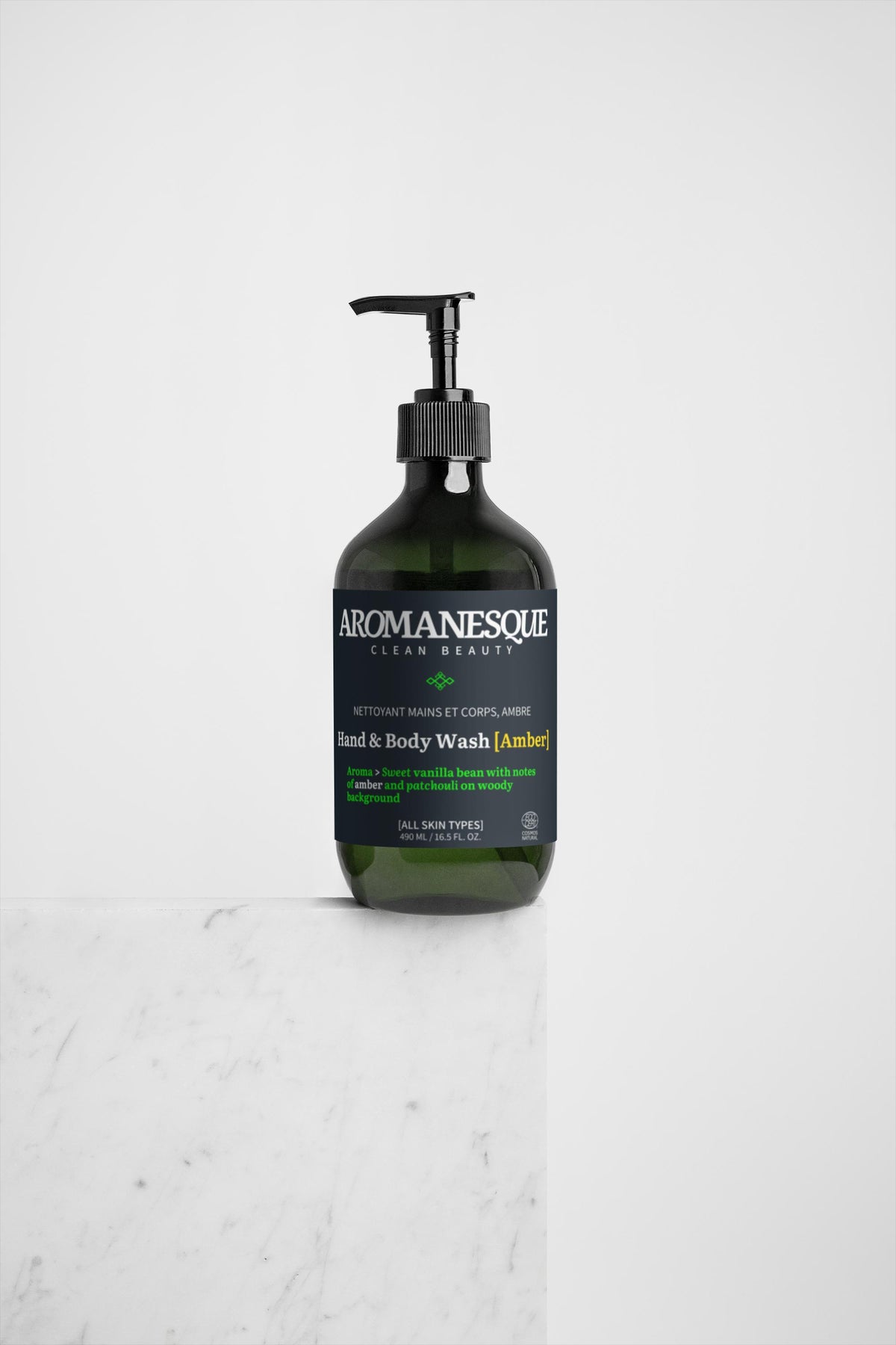 A pump bottle of Aromanesque Hand & Body Wash with patchouli and amber vanilla scents, 490ml.