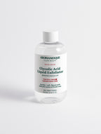A bottle of Aromanesque Glycolic Acid Liquid Exfoliator against a white background.